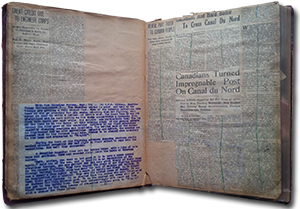 scrap book open to a page with many newspaper articles. headlines include: &ldquo;Great Credit Due to Engineer Corps&rdquo; &ldquo;Reveal Part Truth to German People&rdquo; &ldquo;Canadians Had Hard Battle to Cross Canal Du Nord&rdquo; &ldquo;Canadians Turned Impregnable Post On Canal du Nord&rdquo;