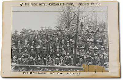 Photo of a group of soldiers in uniform &ldquo;At The Rhine Hotel Godesberg, Germany, December 25, 1918. Men of the Canadian Light Horse Regiment.&rdquo;